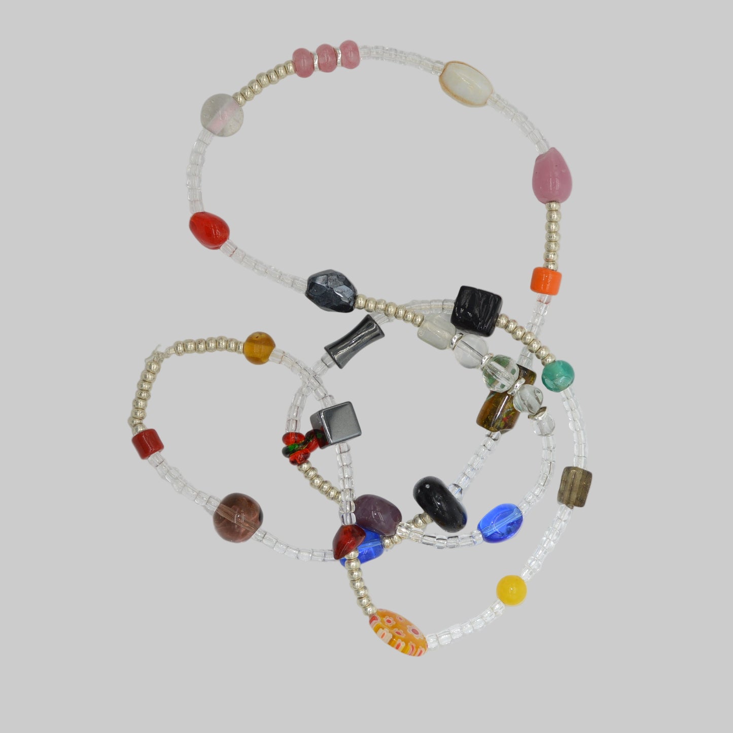 Necklace with multicolored beads on a white background