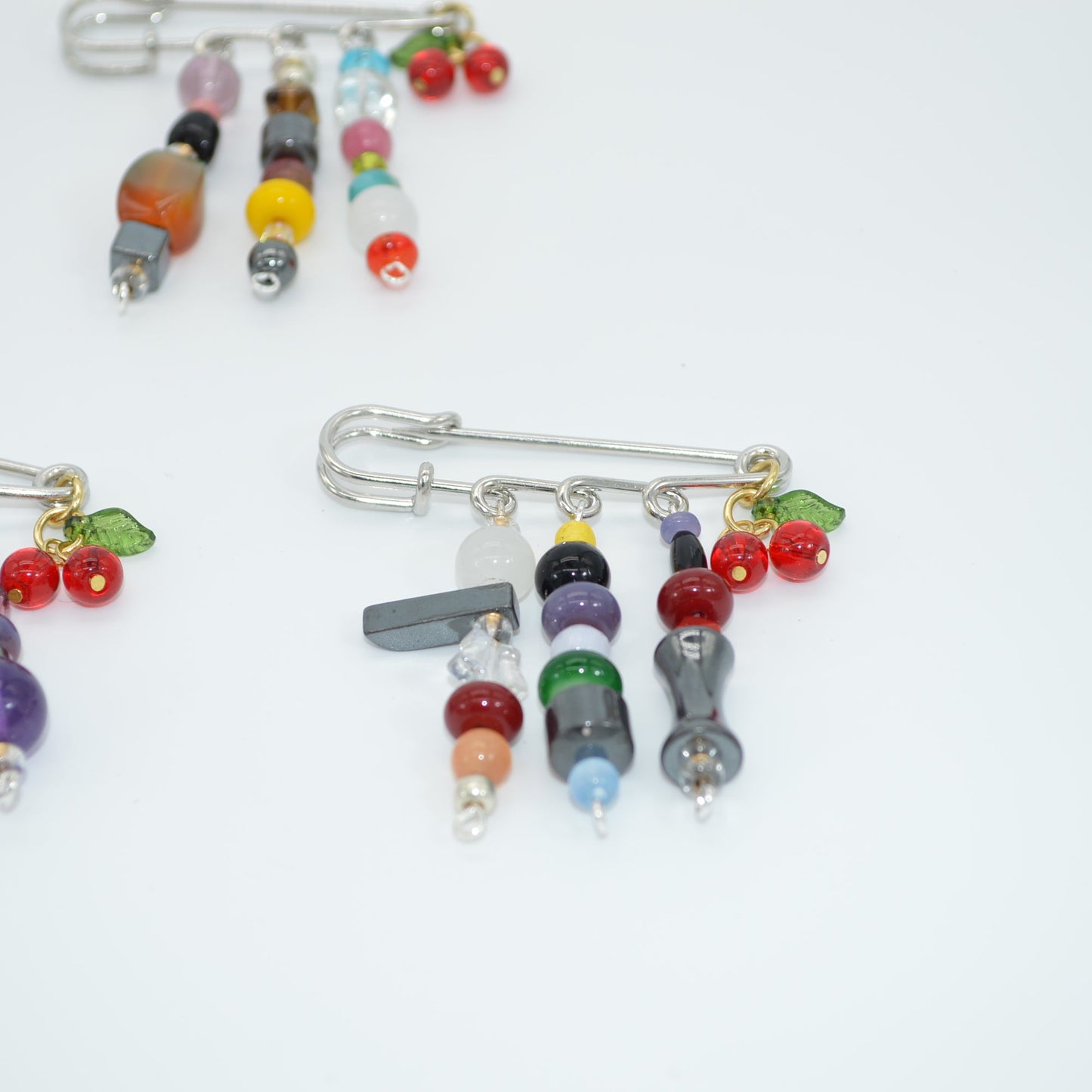 Colorful beaded earrings on a white background