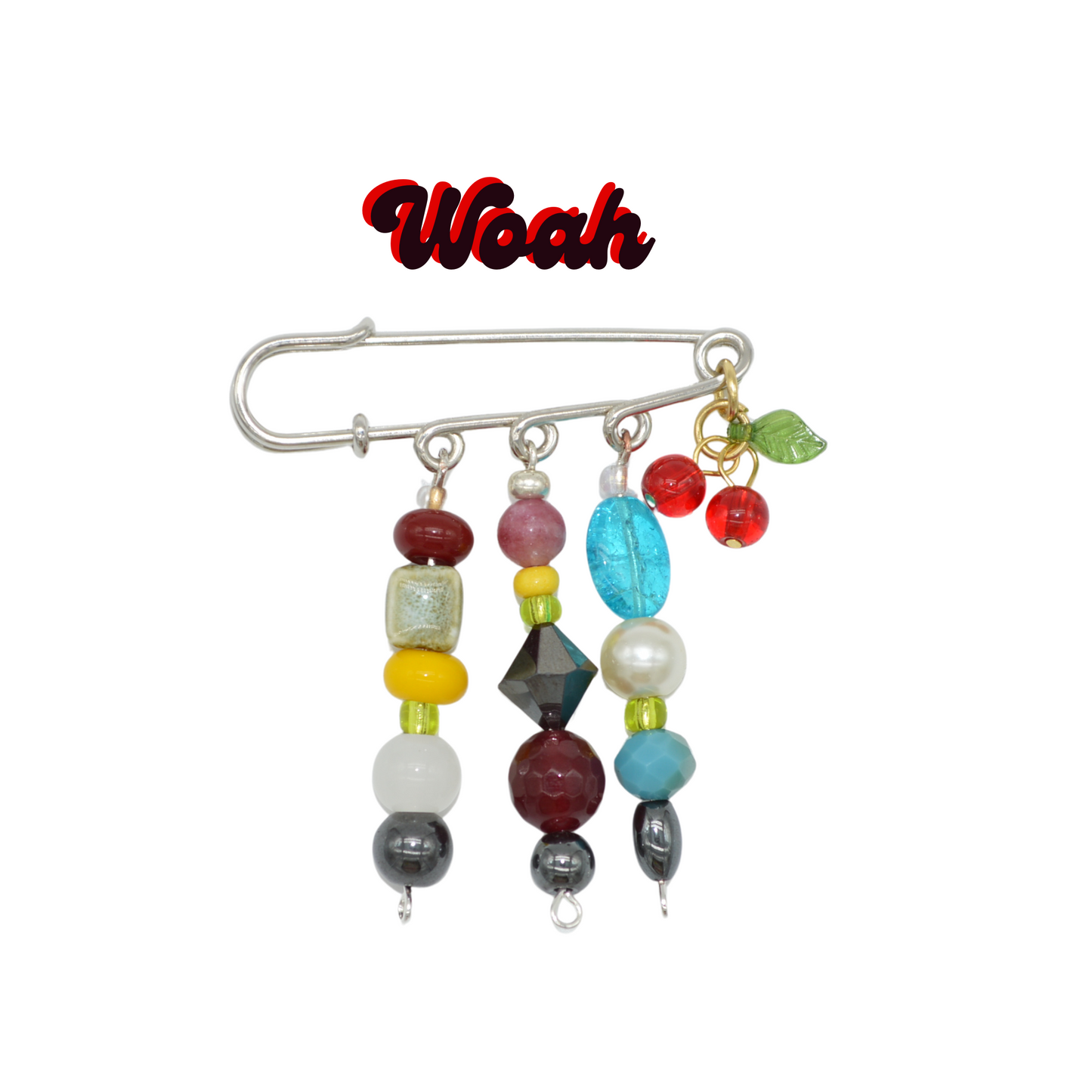 Colorful beaded brooch with a safety pin on a white background
