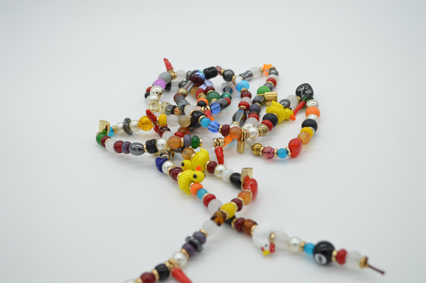 Colorful beaded necklace on a white background