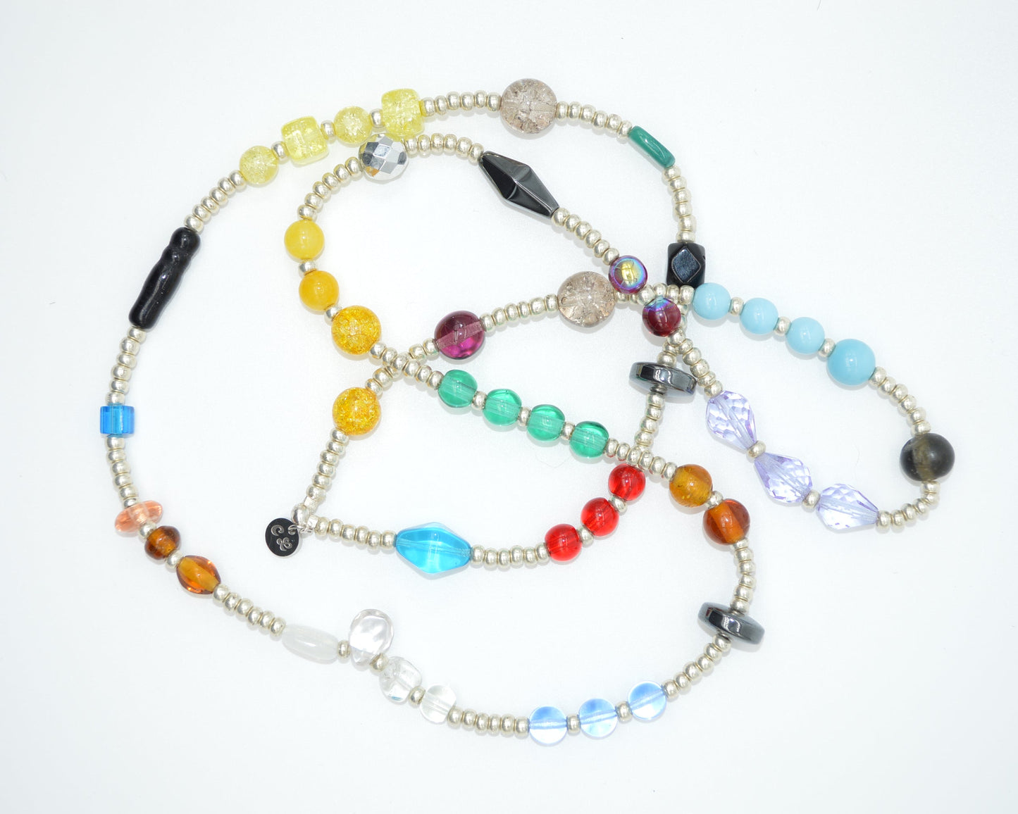 Colorful beaded necklace on a white background