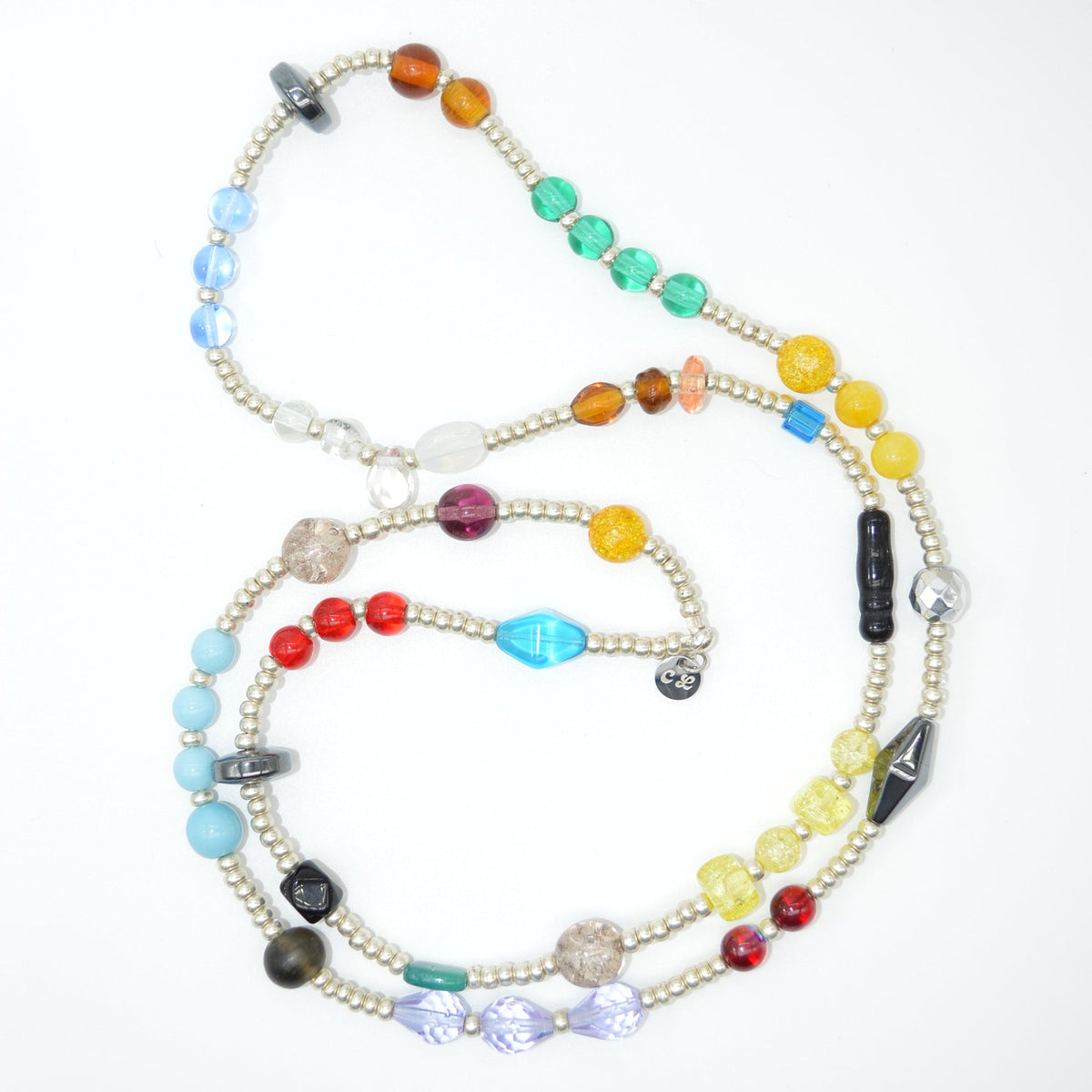Colorful beaded necklace on a white background