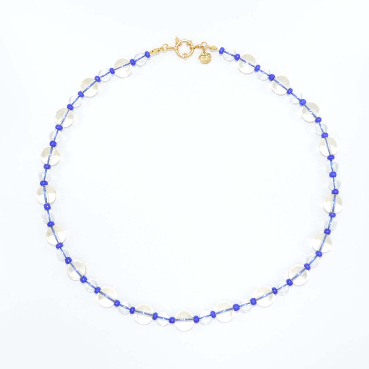 Necklace with blue and white beads on a white background