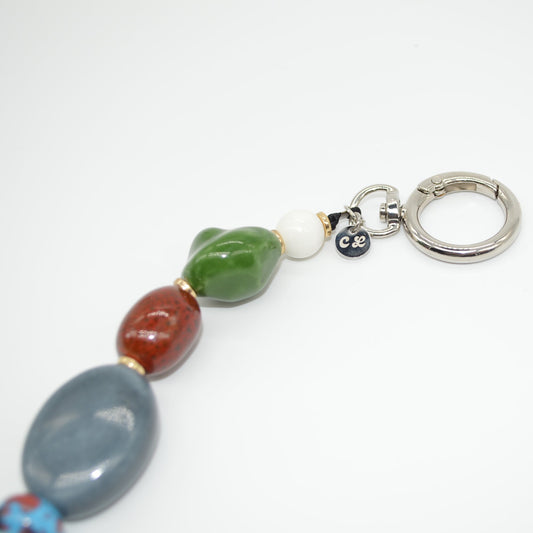 Colorful beaded keychain on a white background