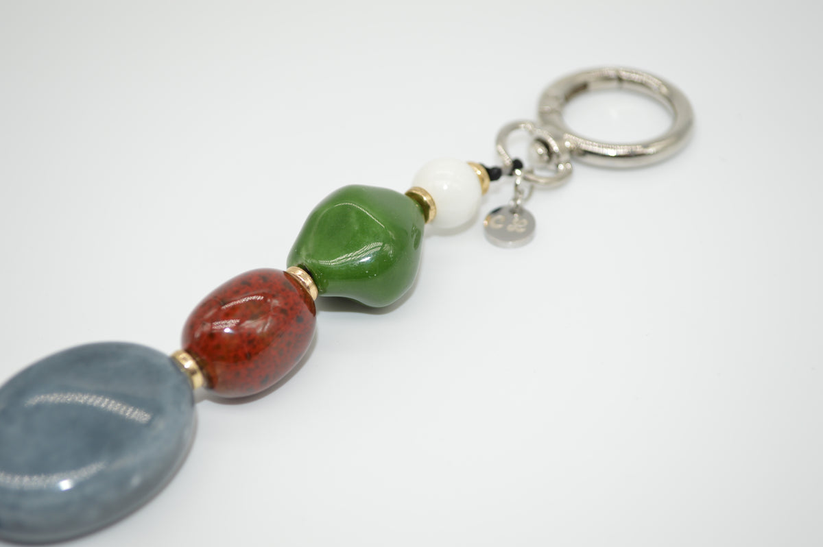 Keychain with colorful beads on a white background
