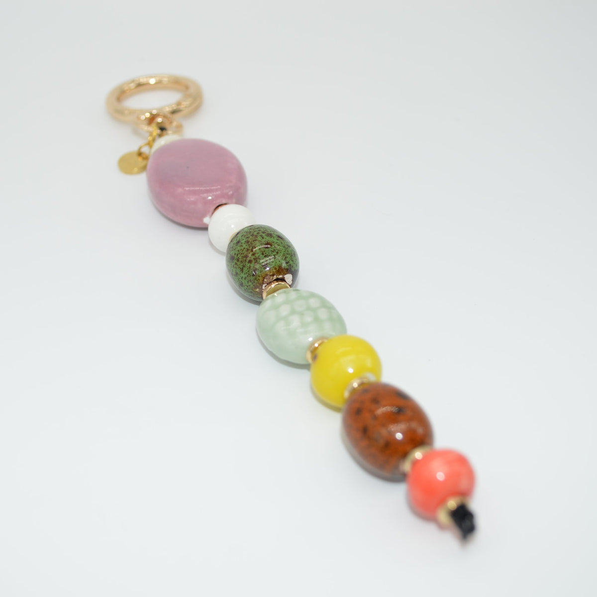 Colorful beaded keychain on a white background