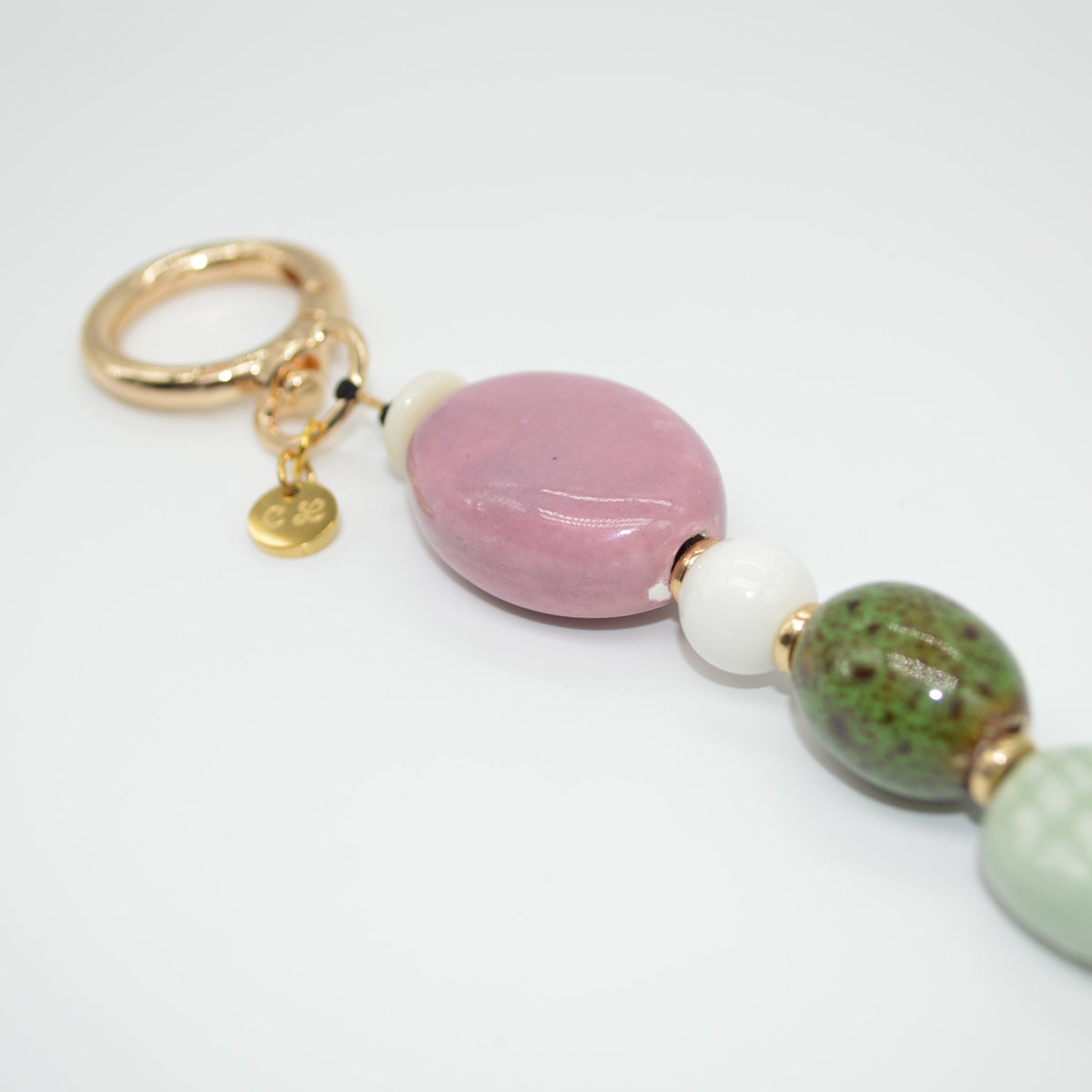 Keychain with colorful beads on a white background