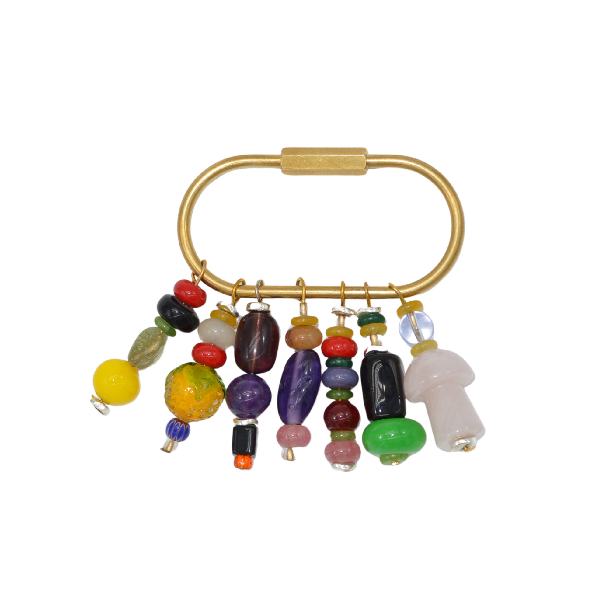 Decorative keychain with colorful beads and a gold ring on a white background