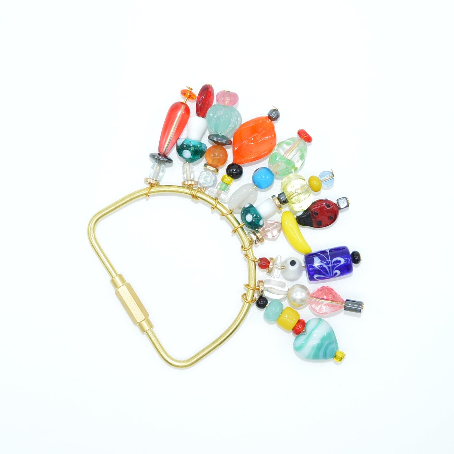 Colorful beaded clip on a white background