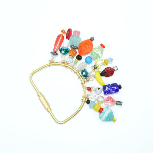 Colorful beaded clip on a white background