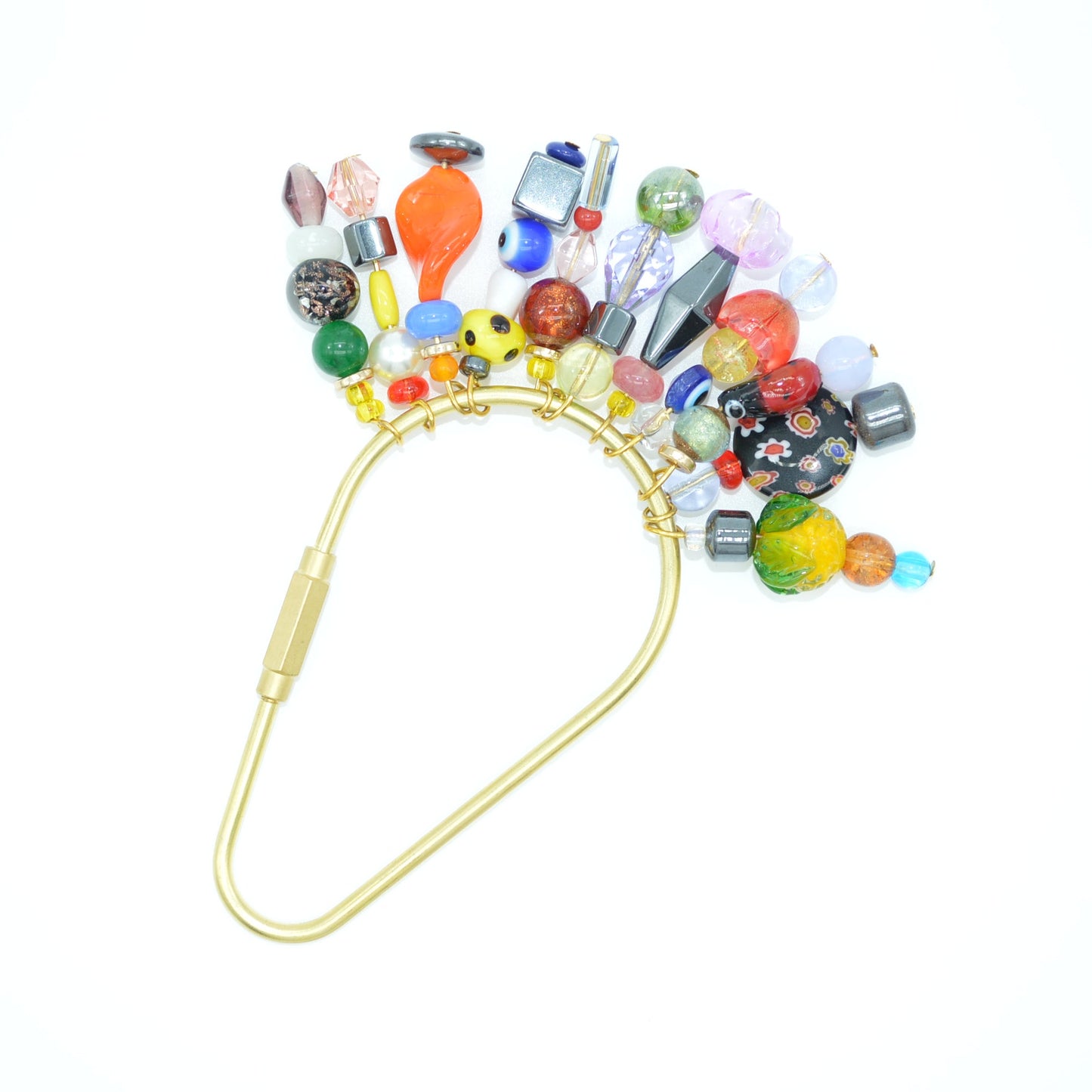 Colorful beaded clip on a white background