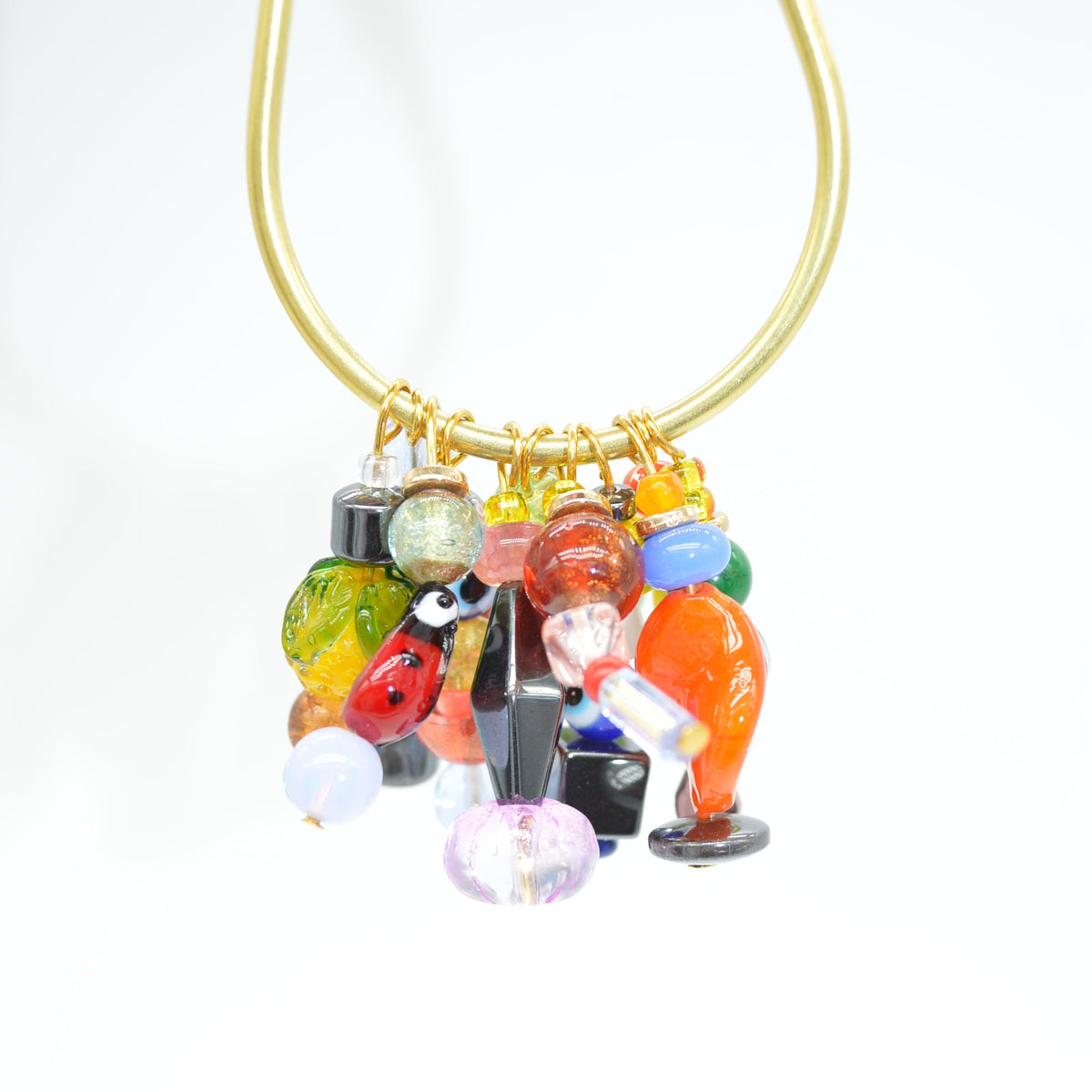 Colorful beaded clip model on a white background