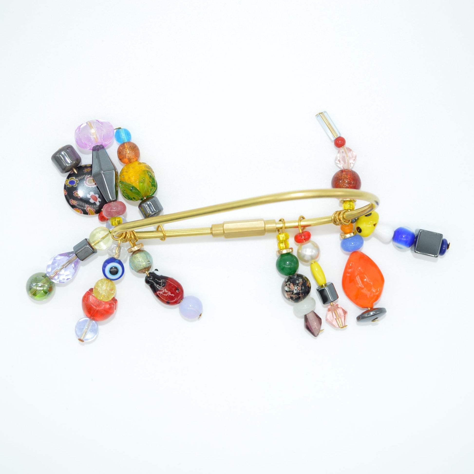 Colorful beaded clip on a white background