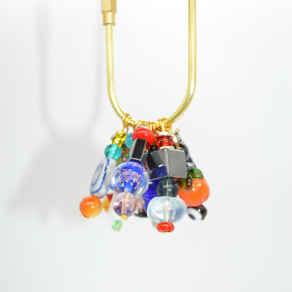 Colorful beaded clip on a white background
