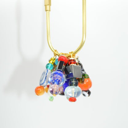Colorful beaded clip on a white background