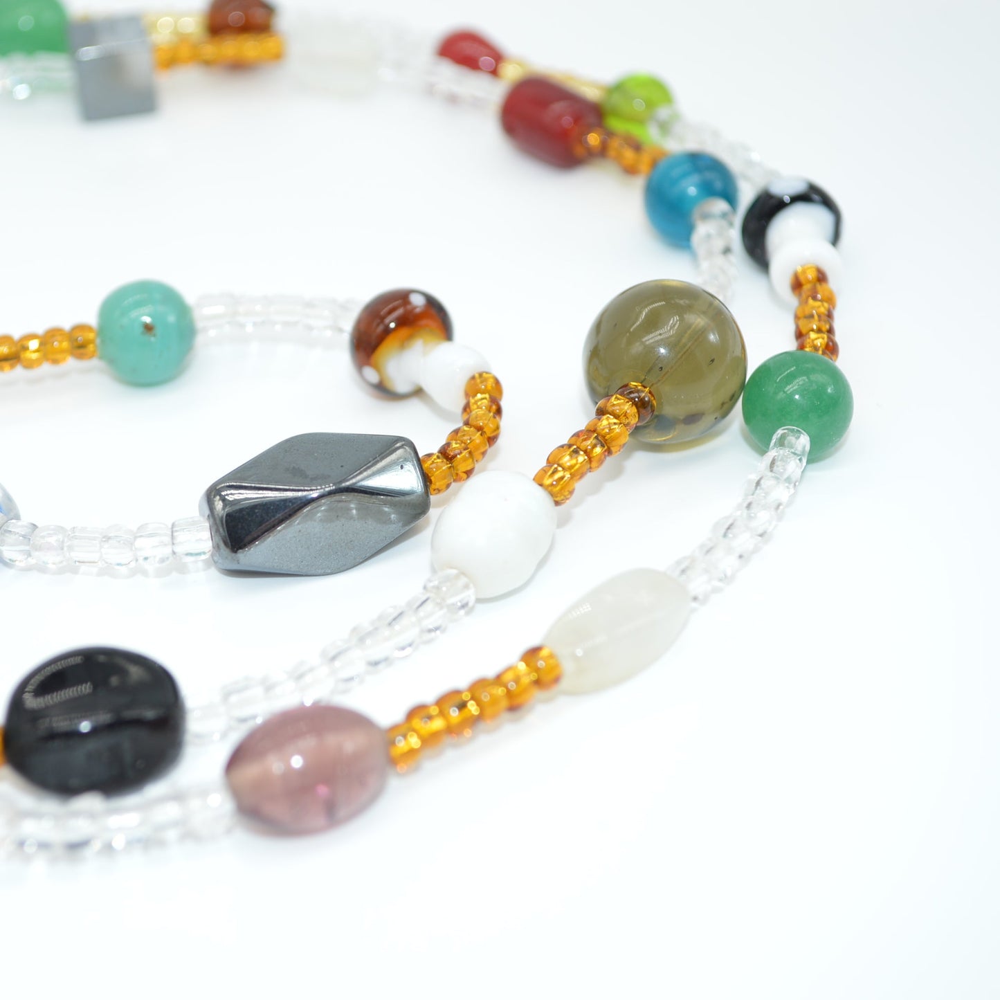 Colorful beaded necklace on a white background