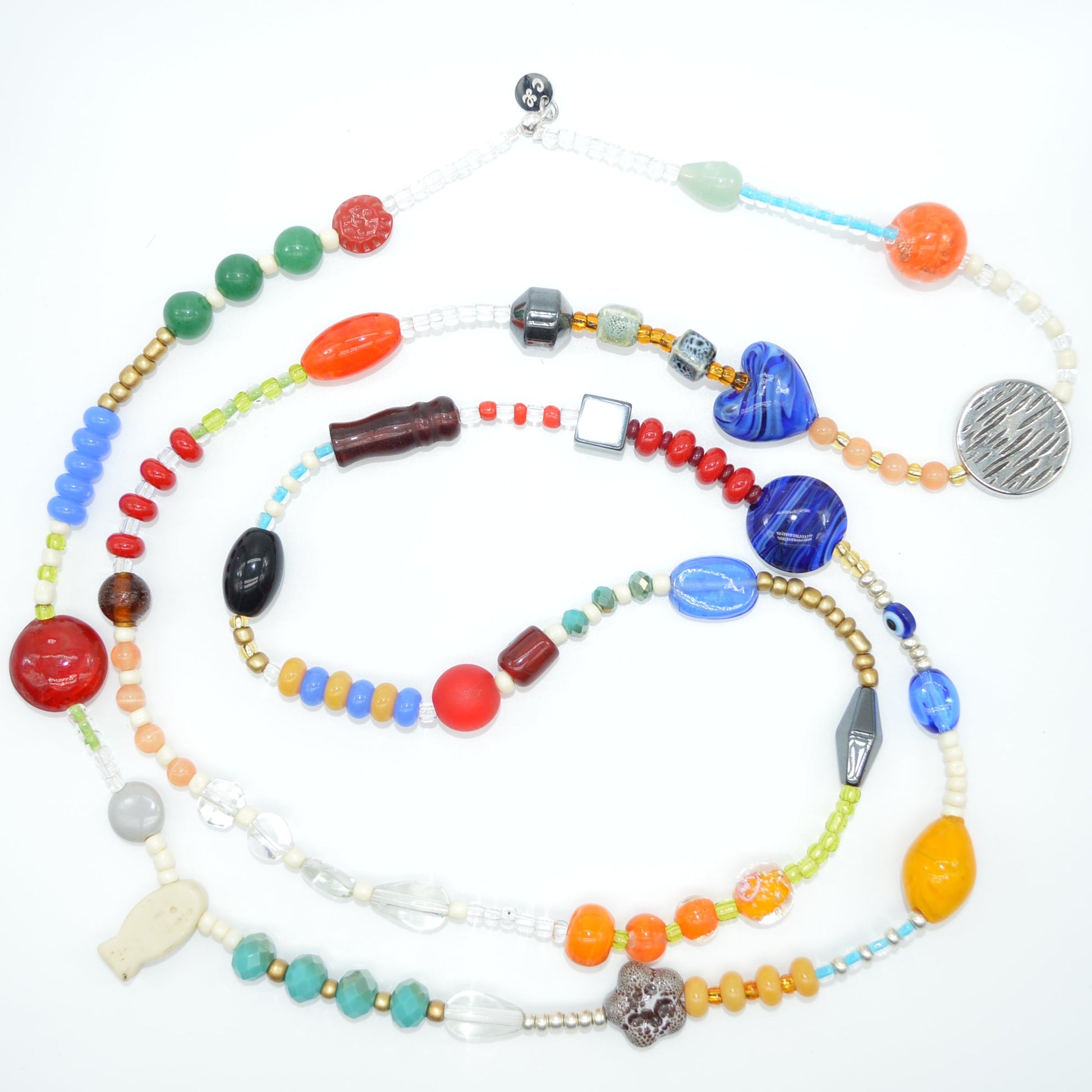 Colorful beaded necklace on a white background
