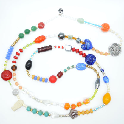 Colorful beaded necklace on a white background
