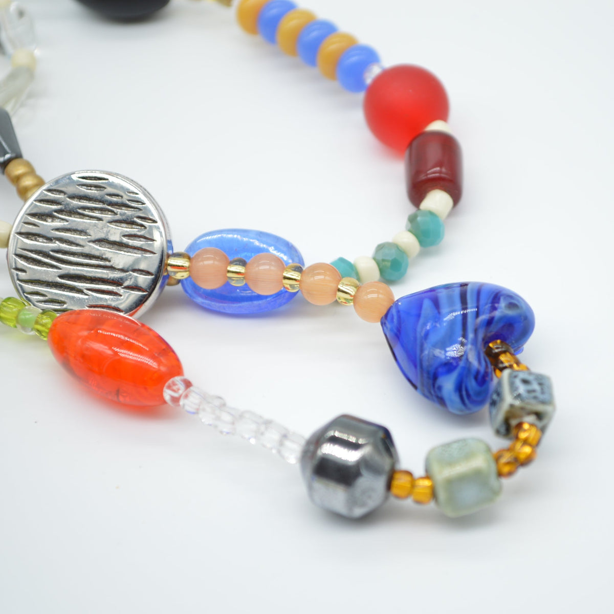 Colorful beaded necklace on a white background