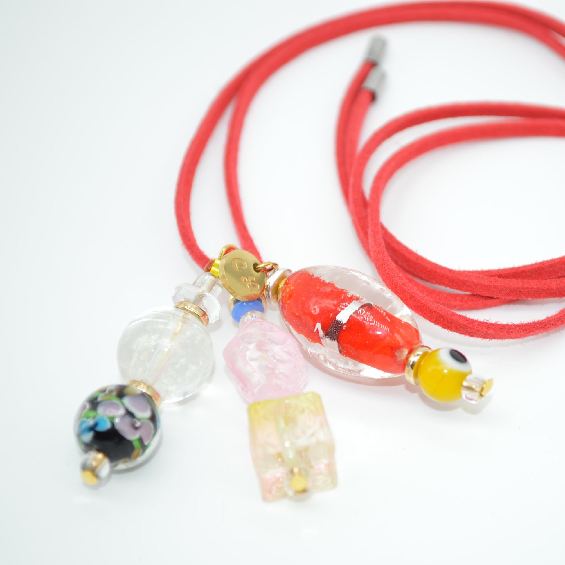 Necklace with colorful beads on a white background