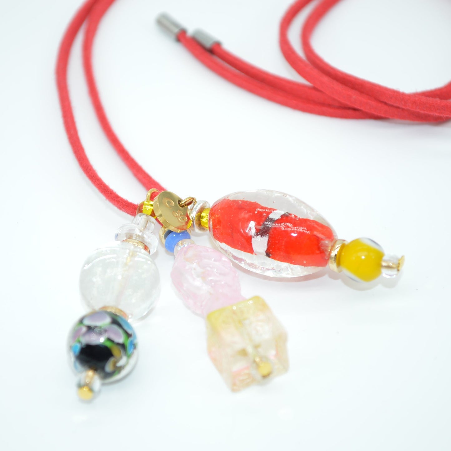 Necklace with colorful beads on a white background