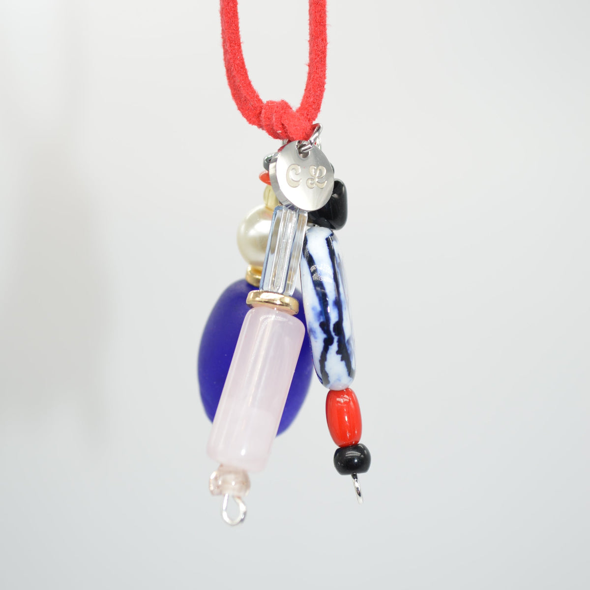 Necklace with colorful beads on a white background