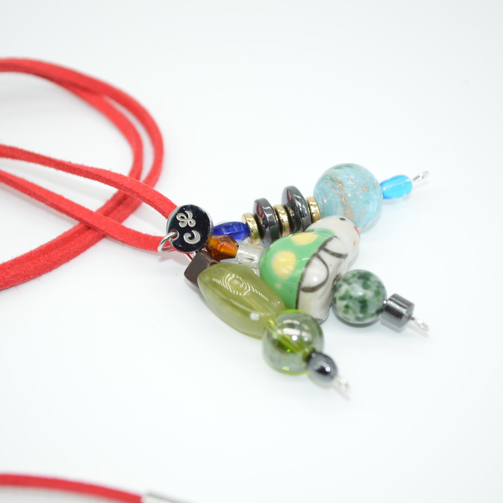 Necklace with colorful beads on a white background