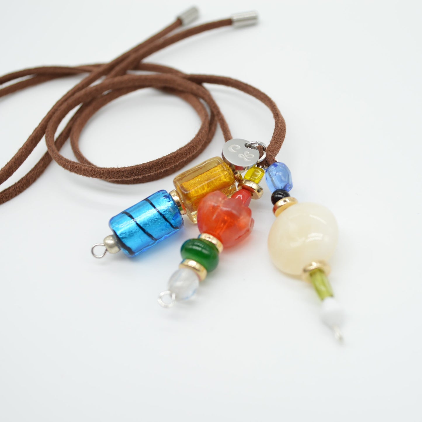 Necklace with colorful beads on a white background