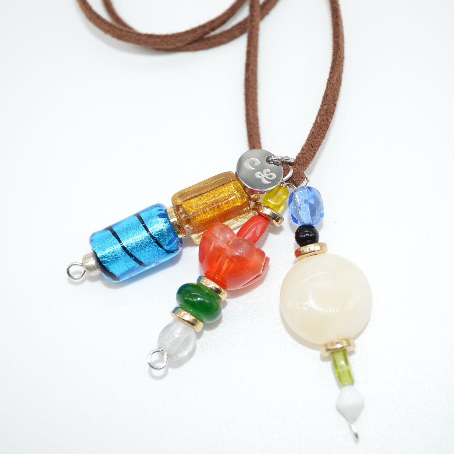Necklace with colorful beads on a white background