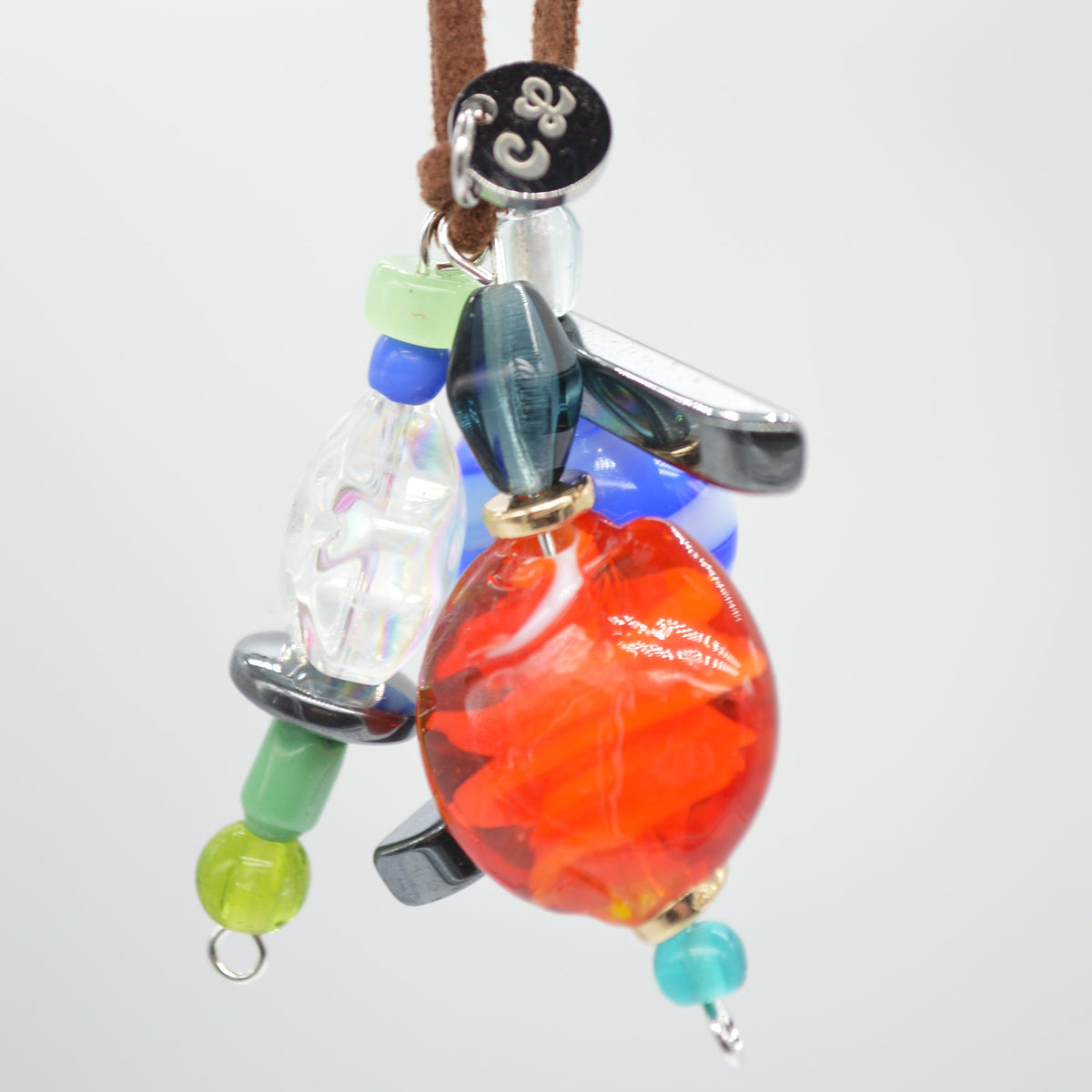 Necklace with colorful beads on a white background