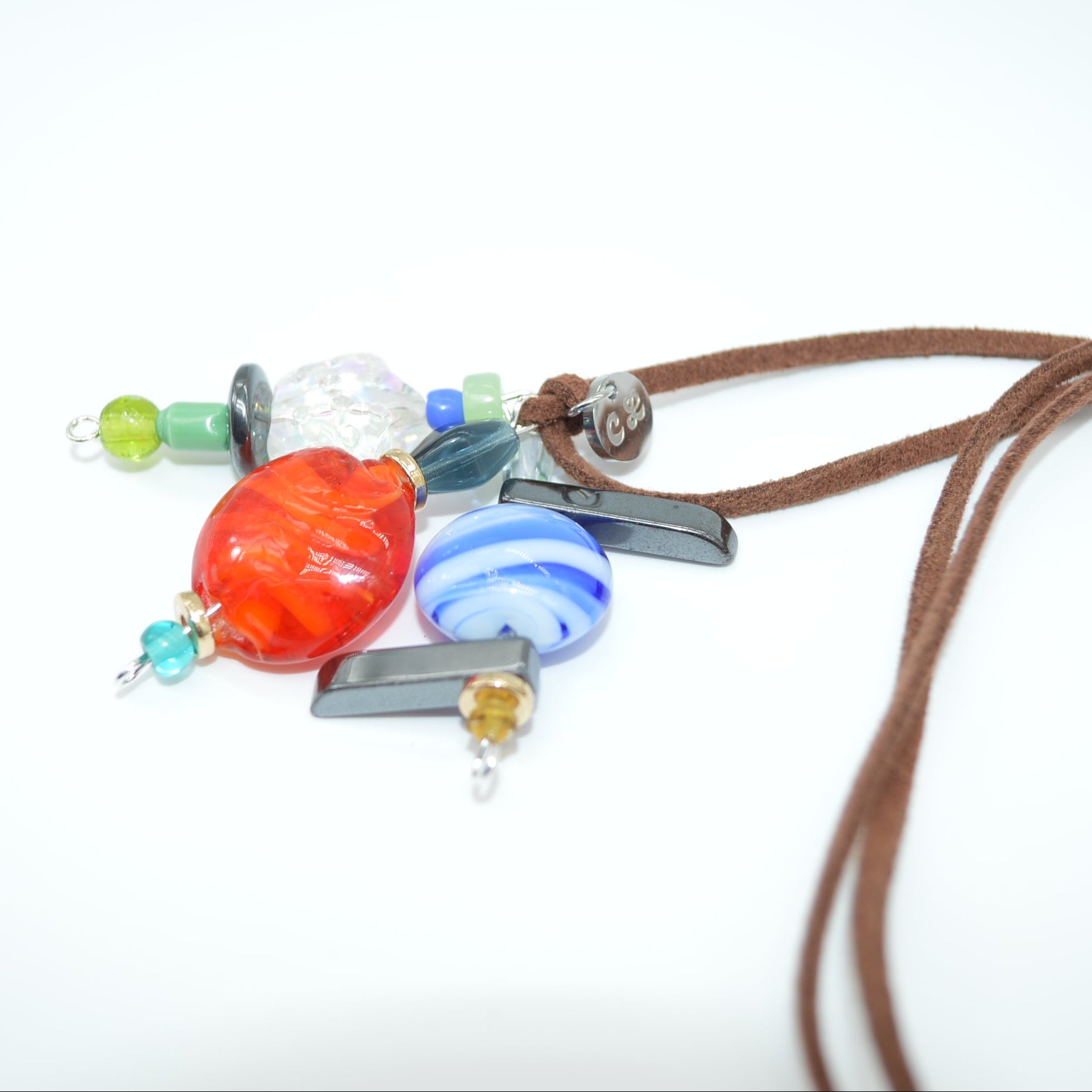 Necklace with colorful beads on a white background
