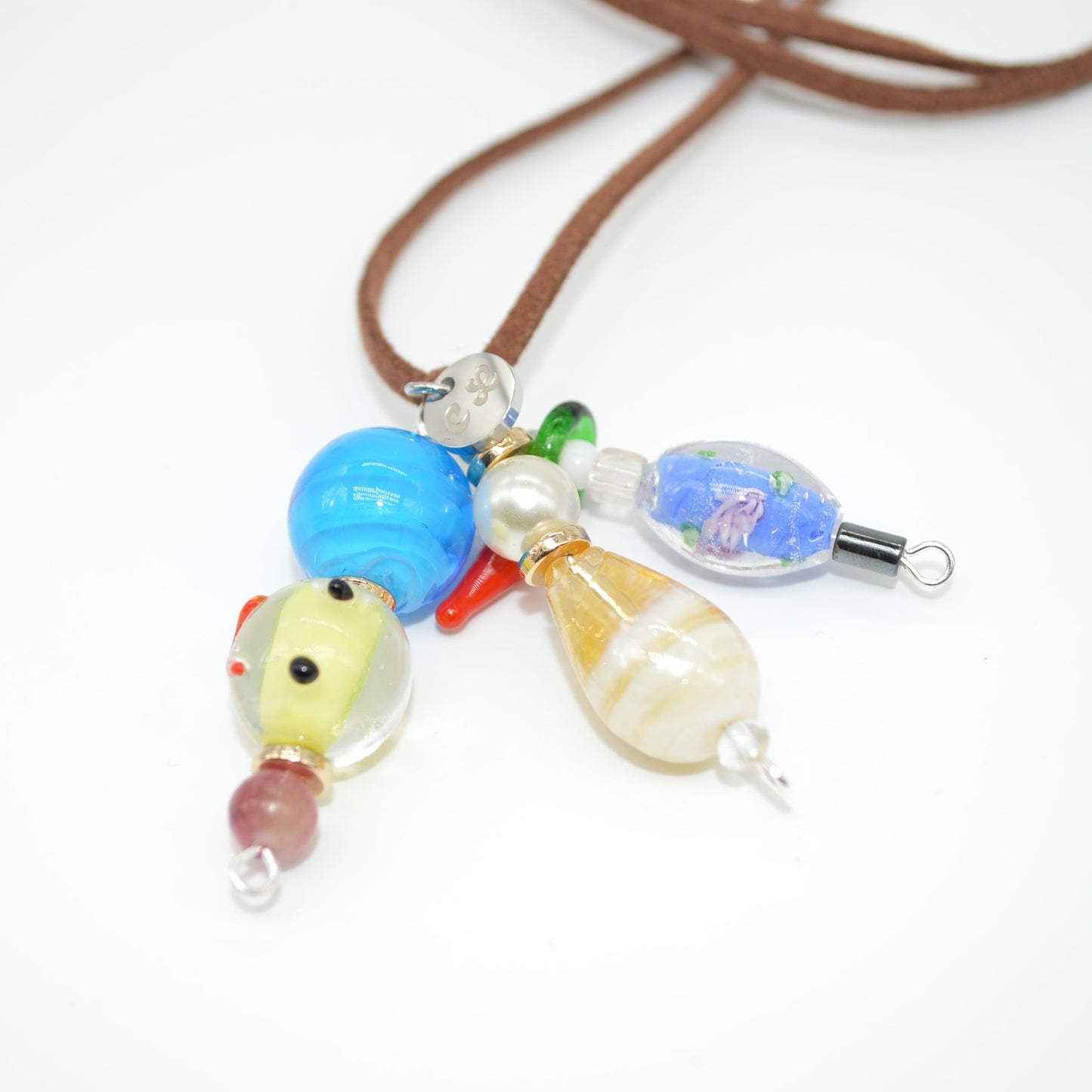Necklace with colorful beads on a white background