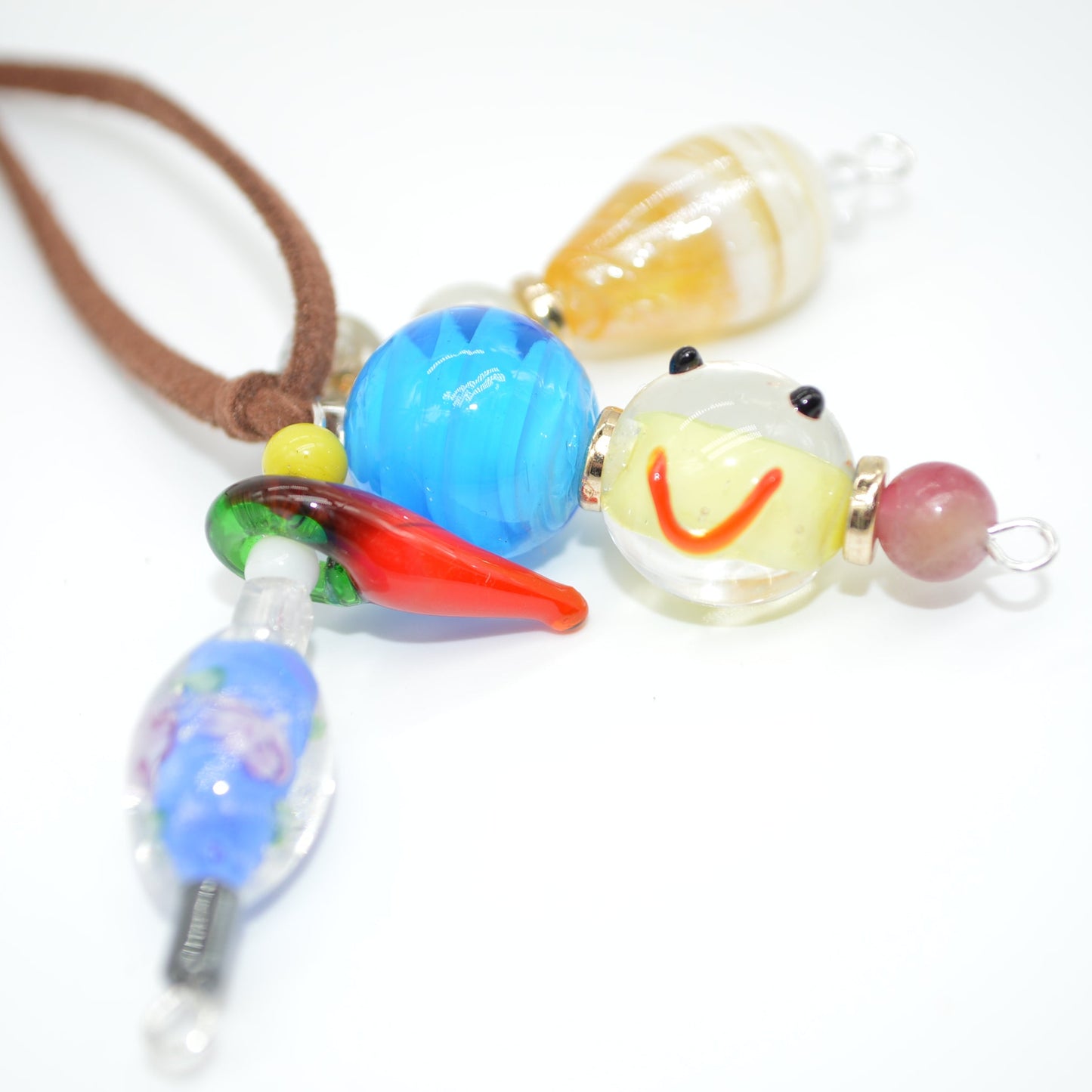 Colorful glass bead necklace on a white background