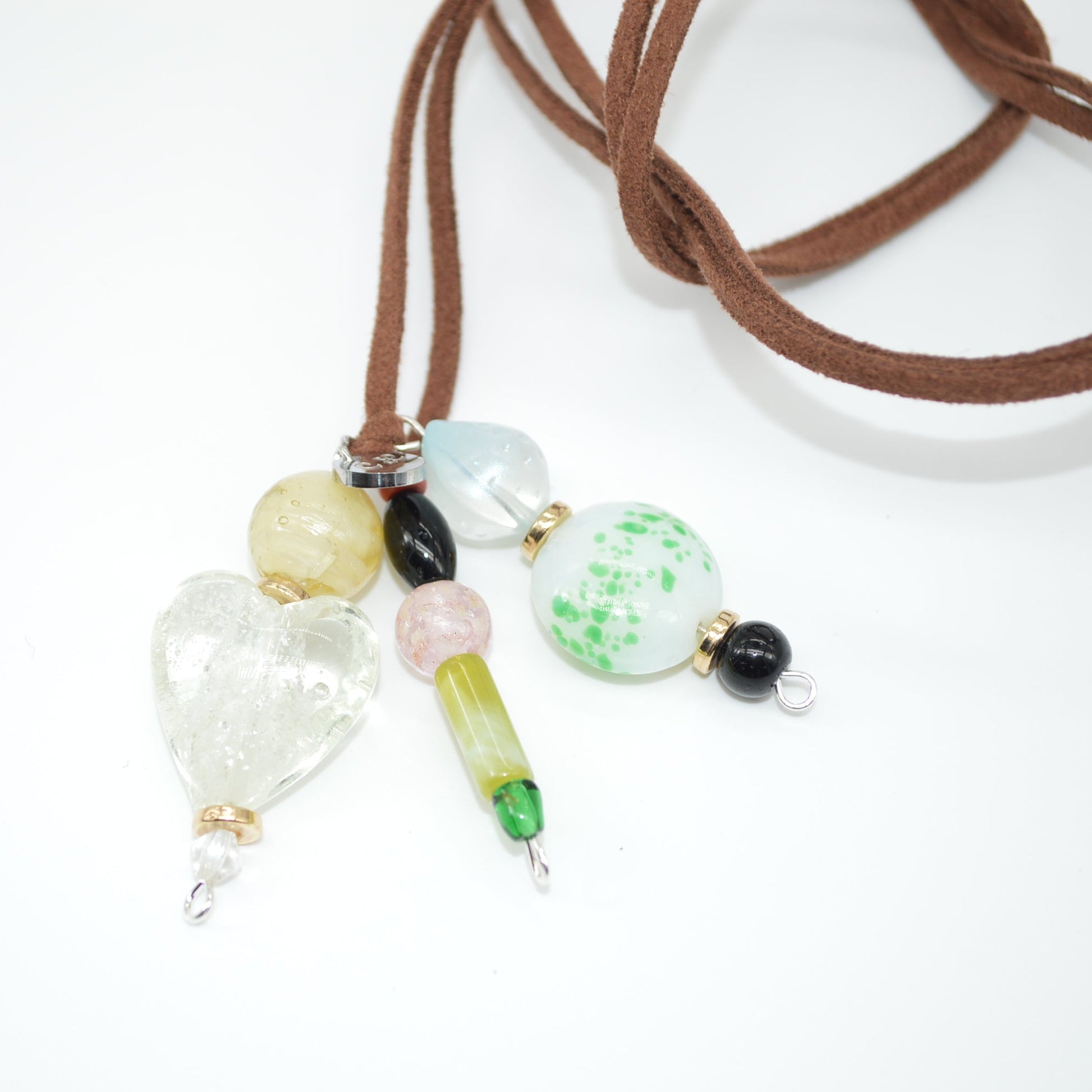 Necklace with colorful beads on a white background