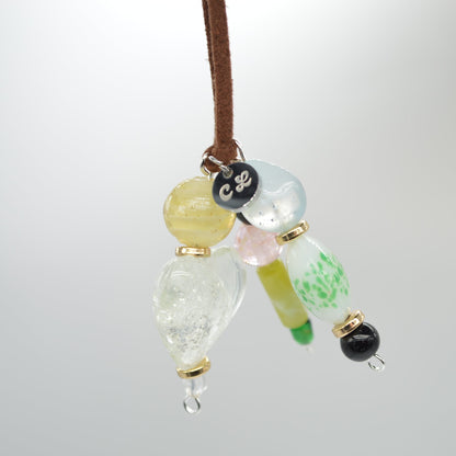 Necklace with colorful beads on a white background