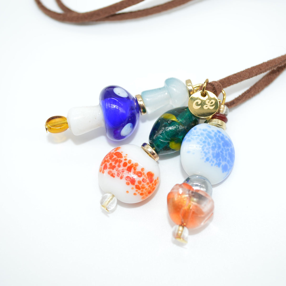 Necklace with colorful glass beads on a white background