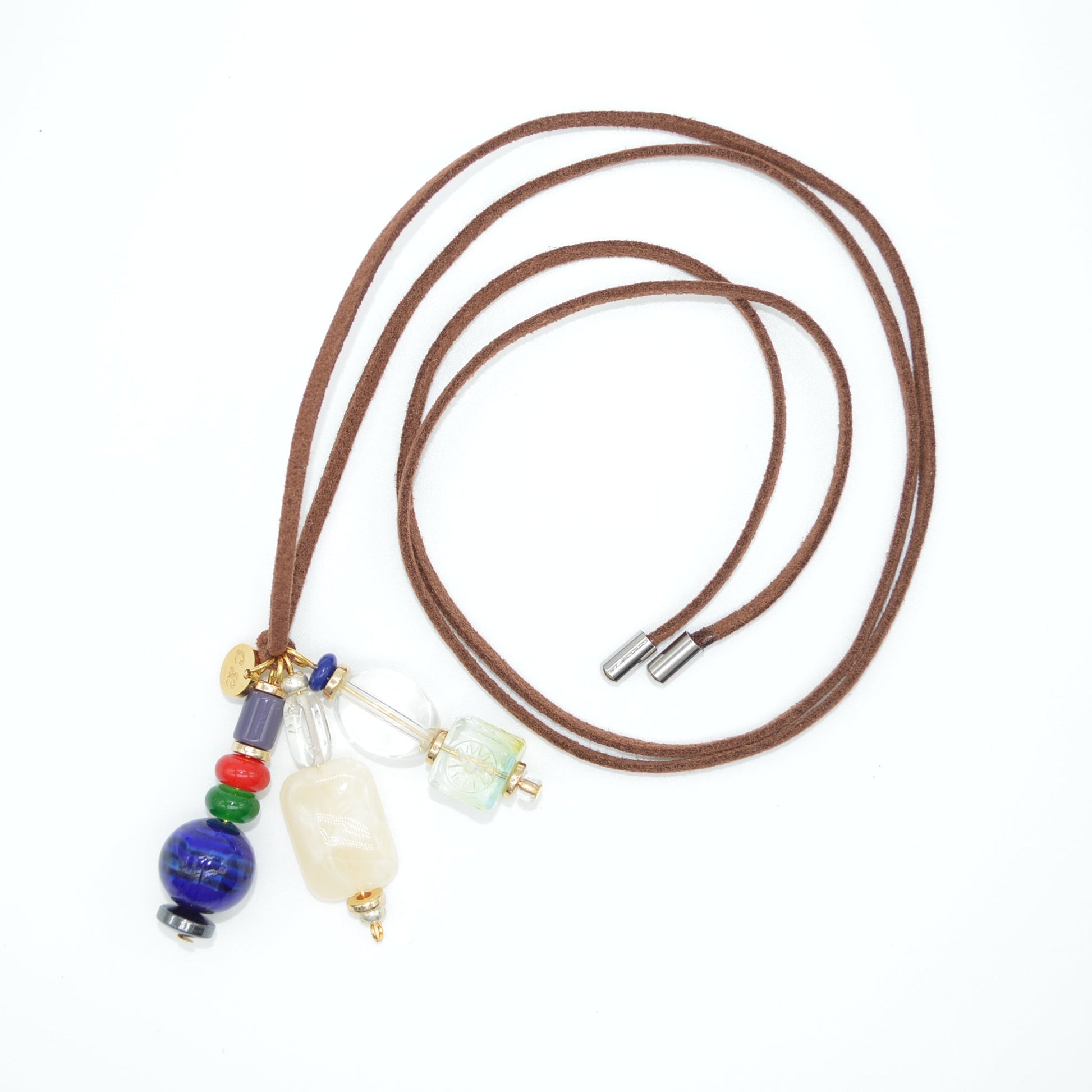 Brown leather cord necklace with colorful beads on a white background