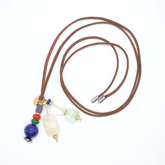 Brown leather cord necklace with colorful beads on a white background