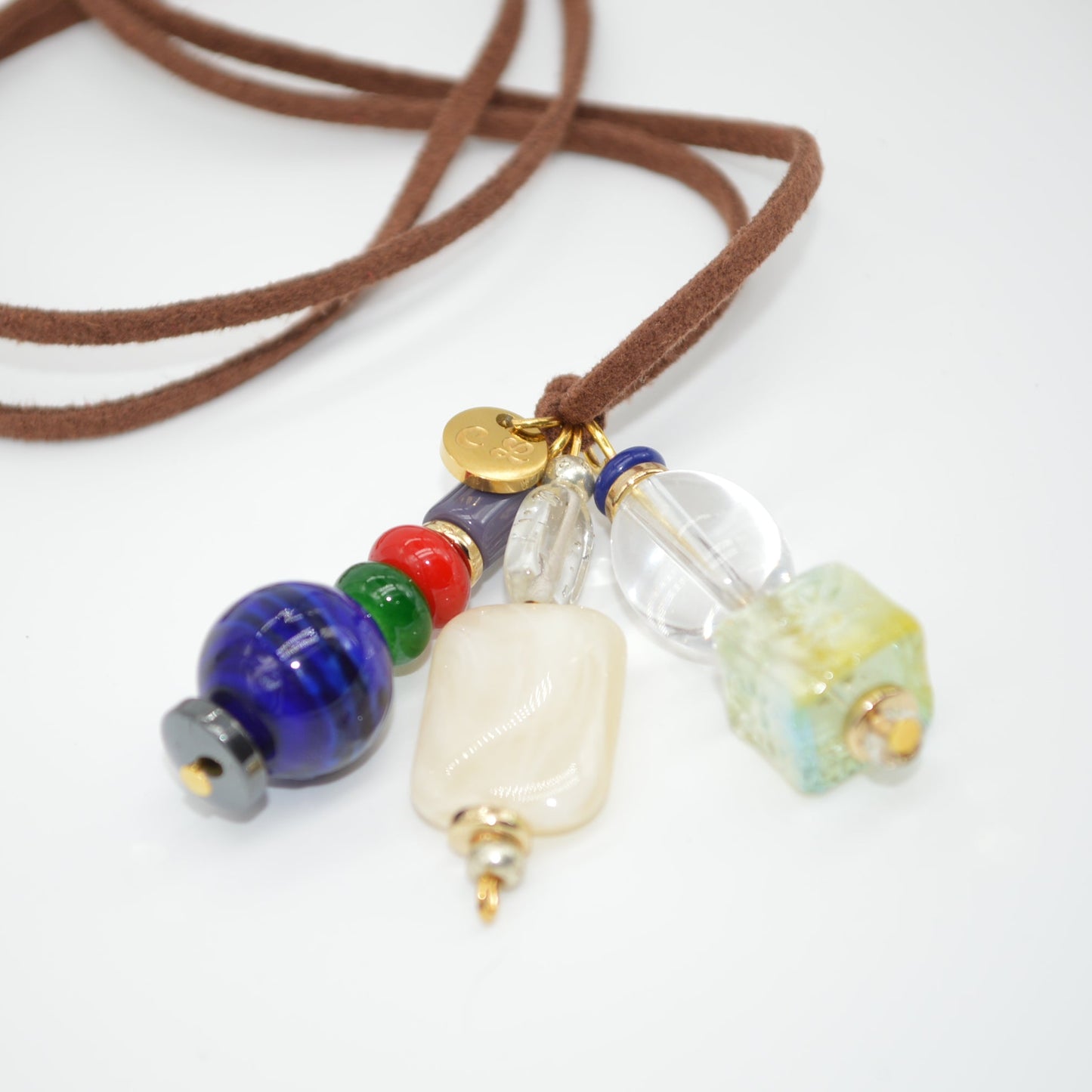 Necklace with colorful beads on a white background