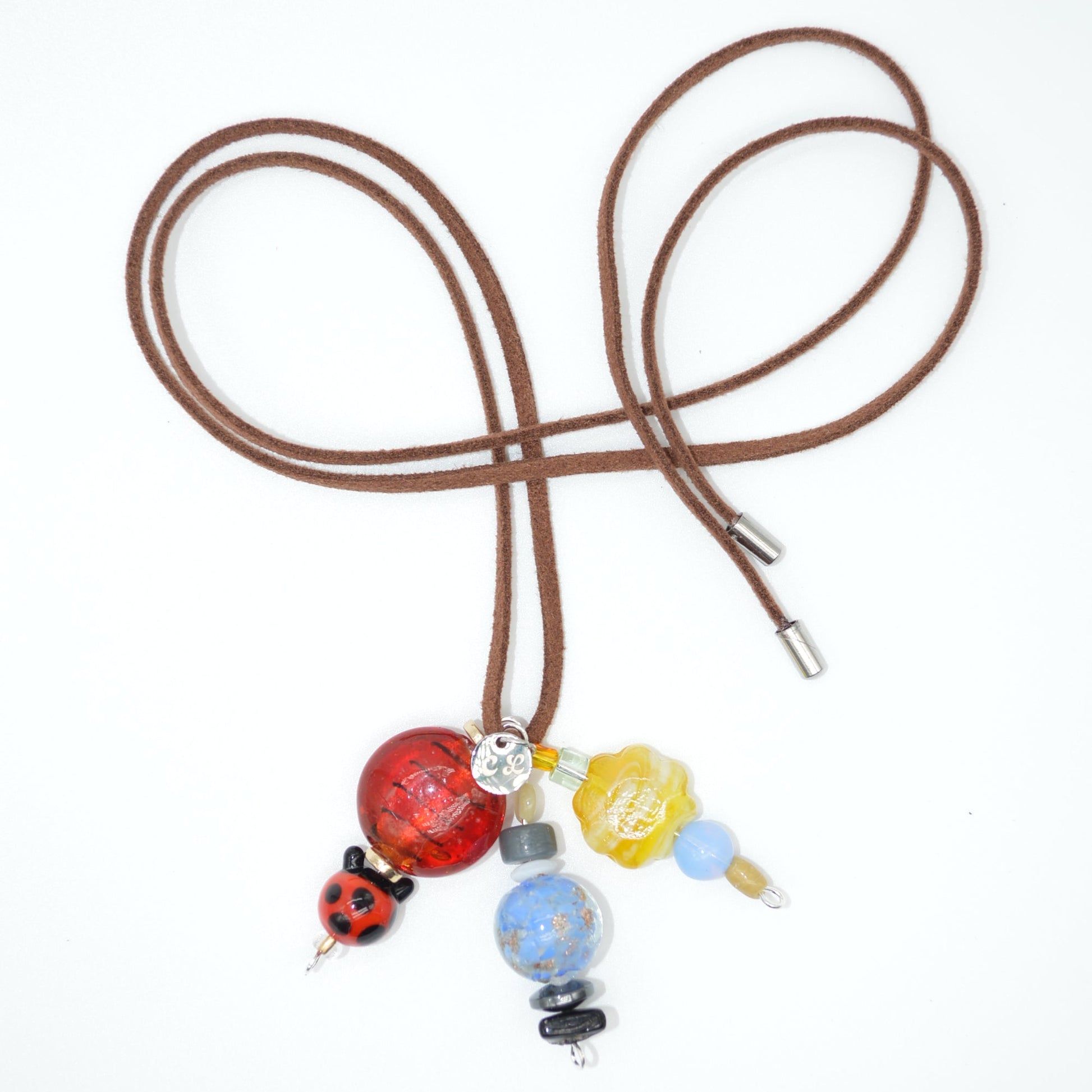 Necklace with colorful beads on a white background