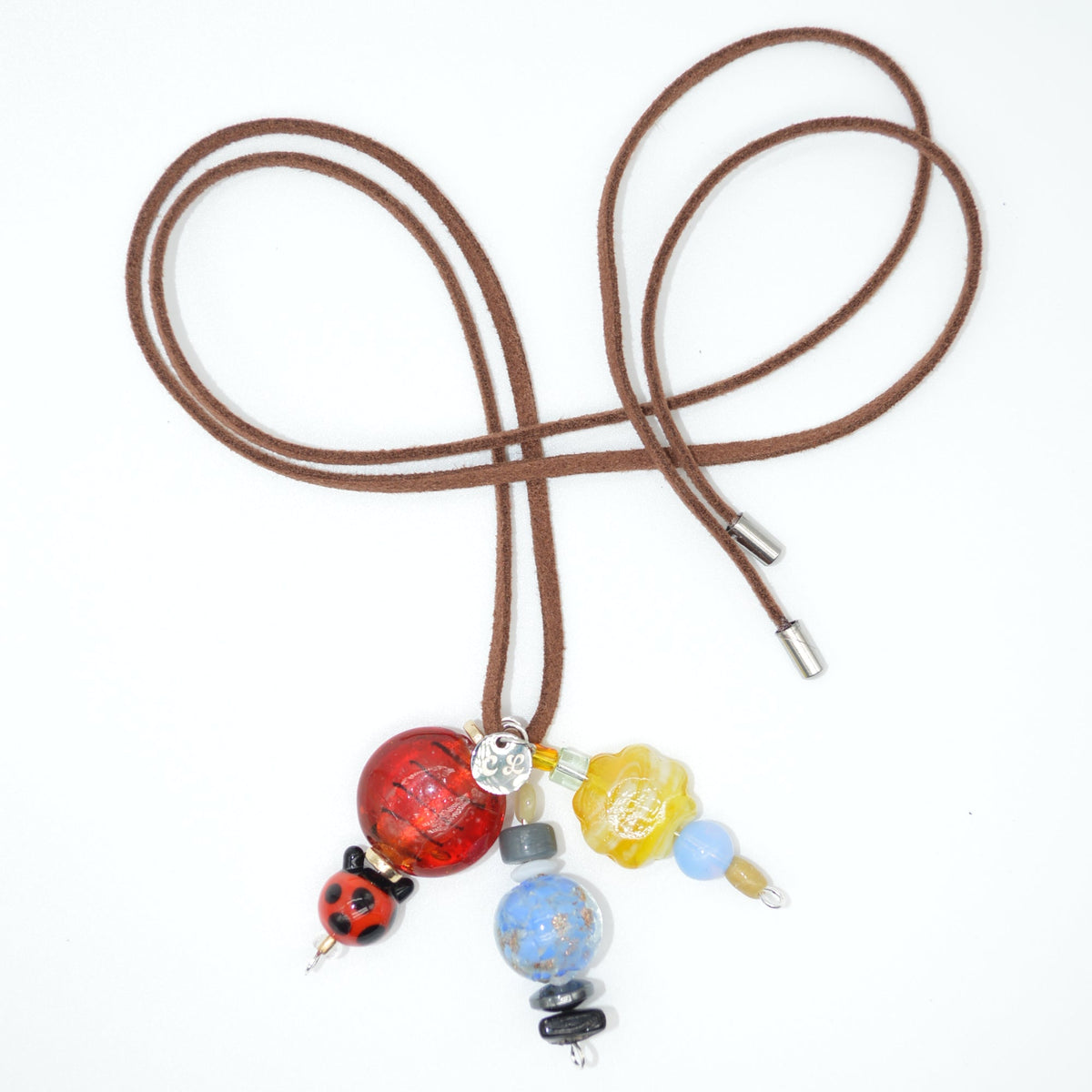 Necklace with colorful beads on a white background
