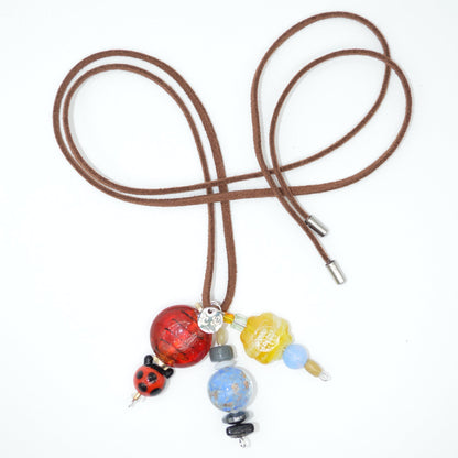 Necklace with colorful beads on a white background