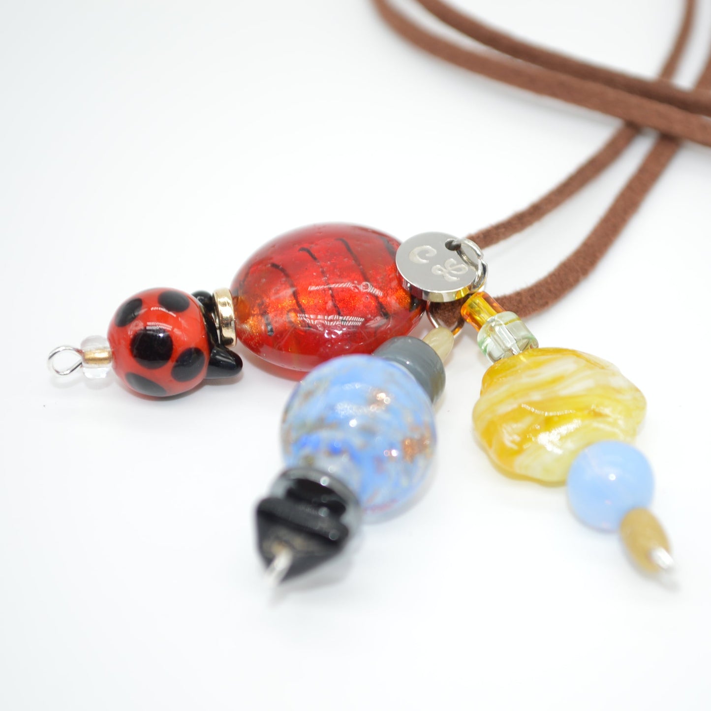 Necklace with colorful beads on a white background