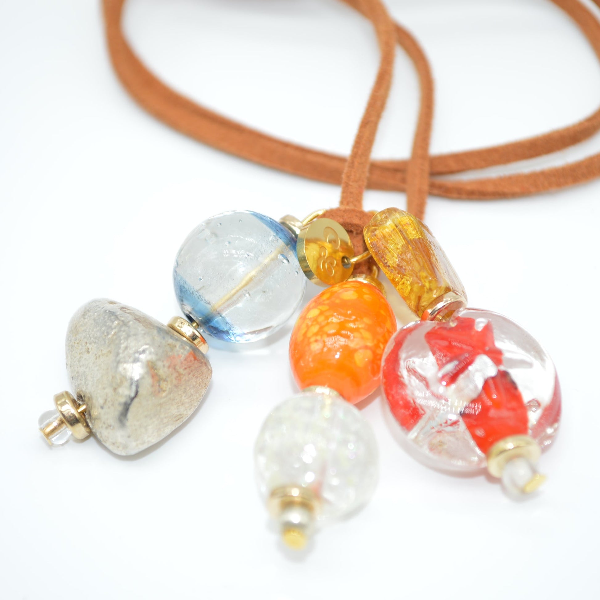 Necklace with colorful glass beads on a white background