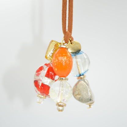 Beaded hair tie with colorful beads on a white background