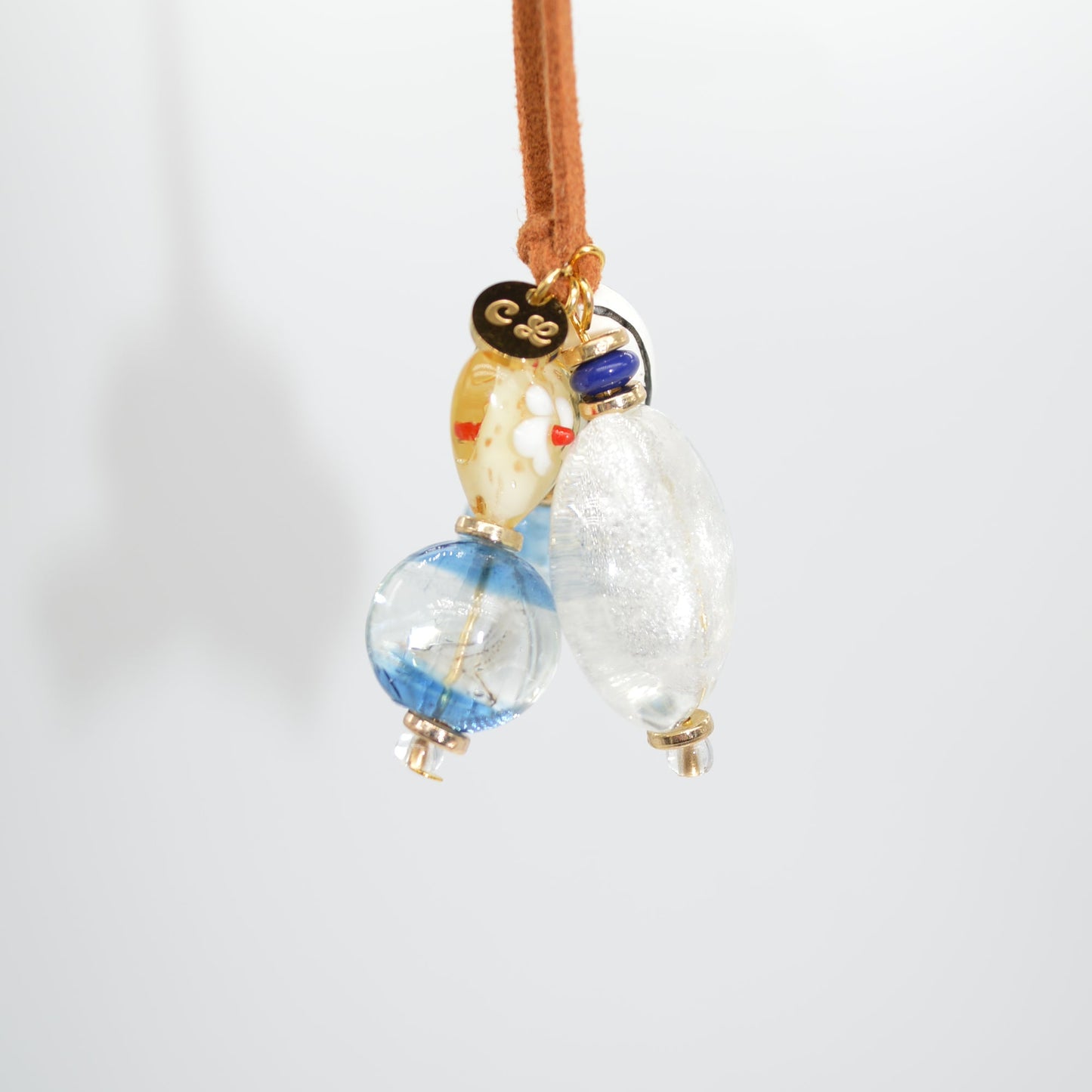 Decorative hair stick with glass beads on a white background