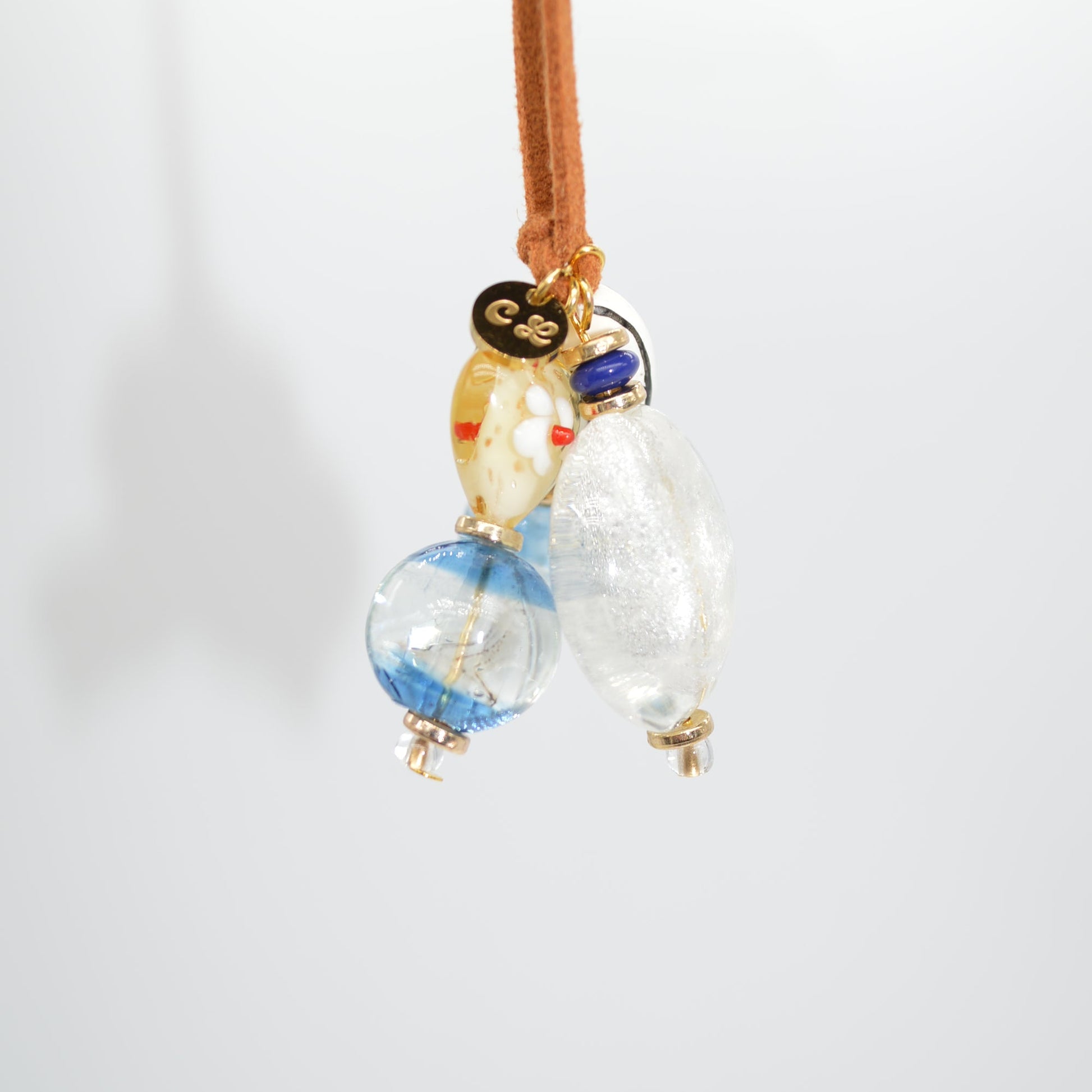 Decorative hair stick with glass beads on a white background