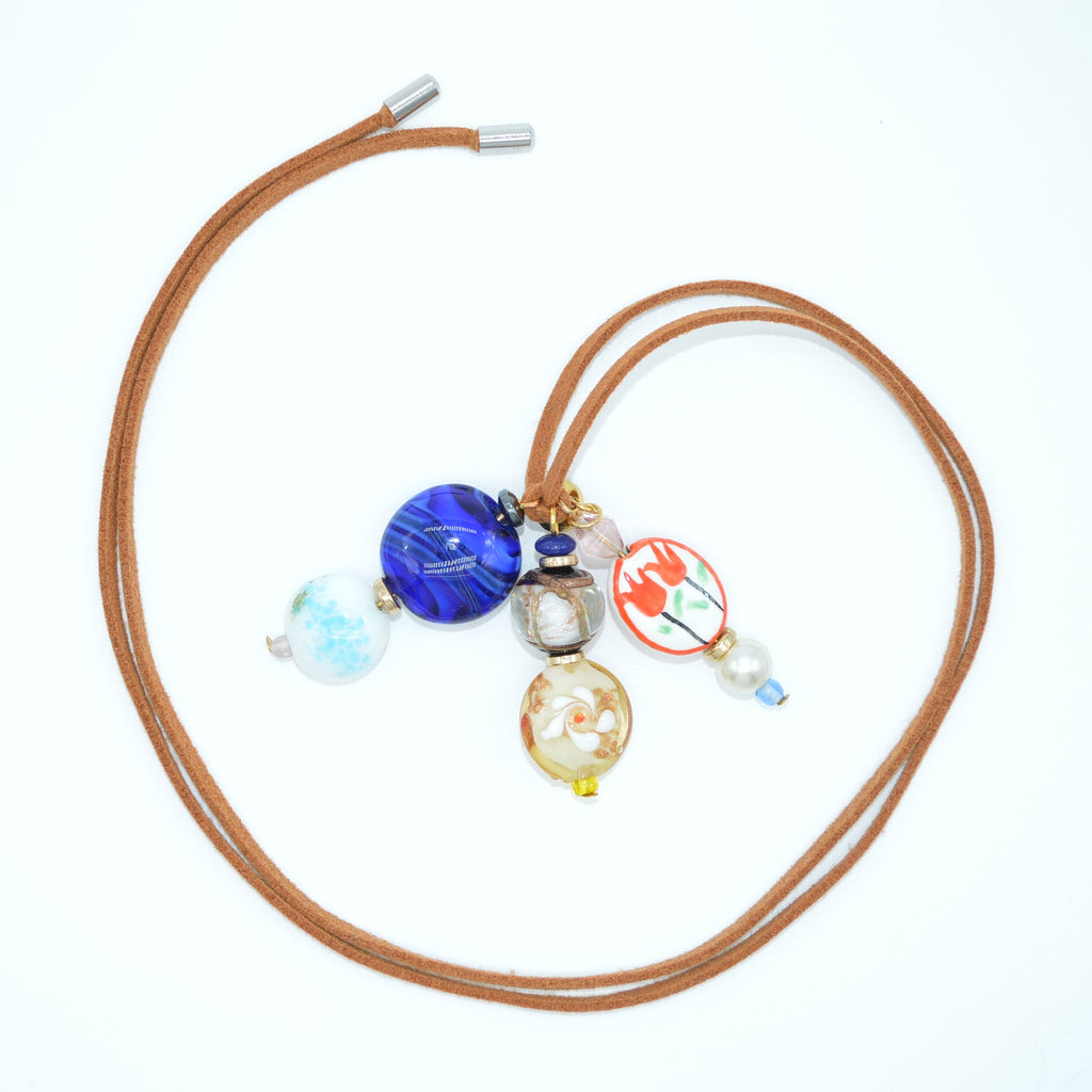 Necklace with colorful beads on a white background