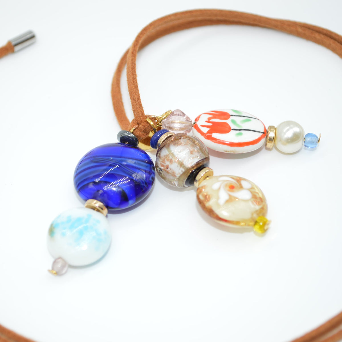 Necklace with colorful beads on a white background