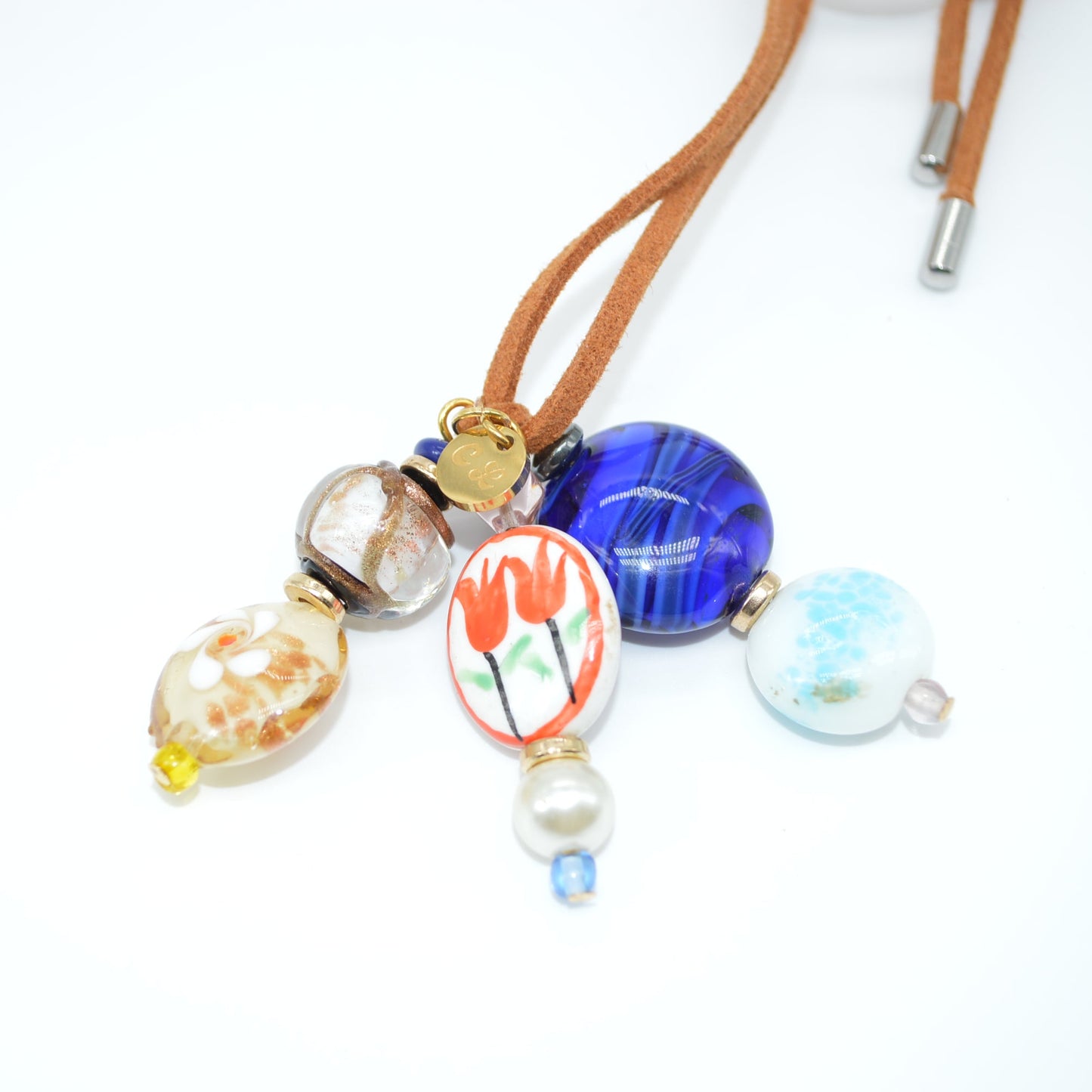 Necklace with colorful beads on a white background